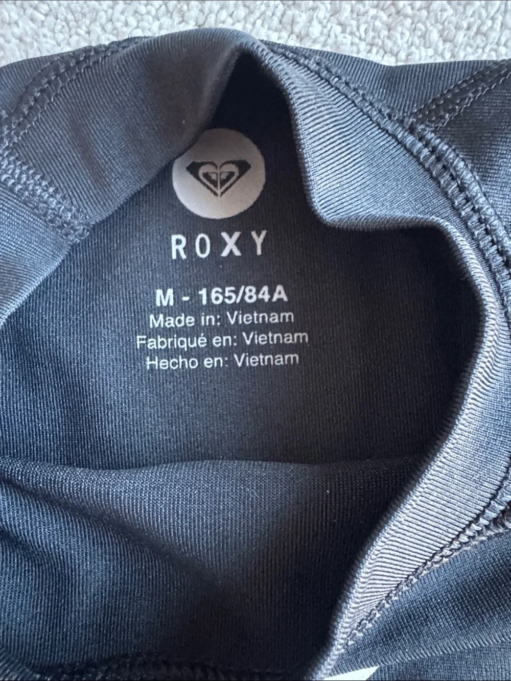 Roxy Black Short Sleeve Swim Top with White Logo